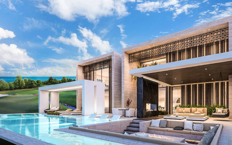 alt: Hình ảnh thiết kế bể bơi hình chữ nhật trong khuôn viên biệt thự, xung quanh được ốp lát gạch và trang trí cây xanh.