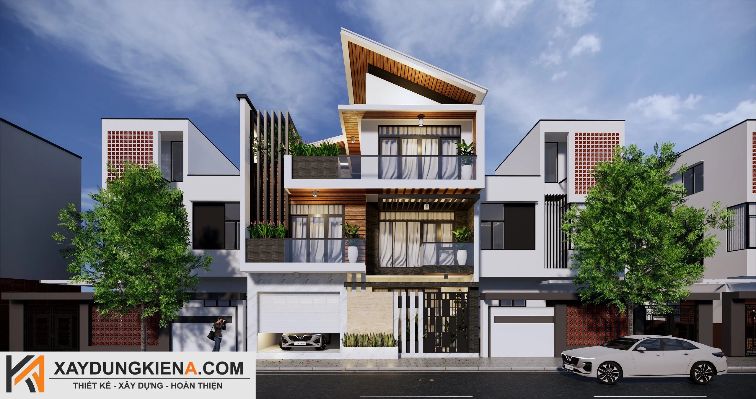 alt: Mẫu nhà 1 trệt 2 lầu mái lệch hiện đại với ban công kính và sân thượng